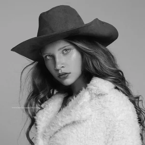Clothing, Hat, Beauty, Lip, Black-and-white, Fur, Headgear, Fashion accessory, Model