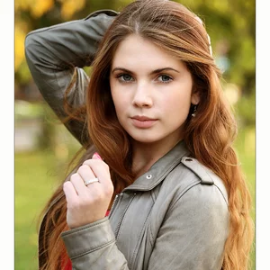 Face, Beauty, Hairstyle, Lip, Brown hair, Blond, Long hair, Layered hair, Leather