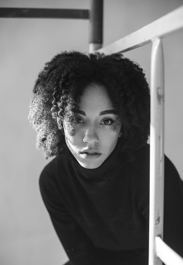 White, Face, Black, Hairstyle, Afro, Black-and-white, Eyebrow, Head, Beauty
