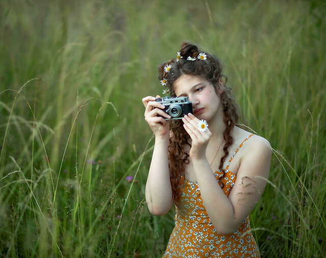 Девочка фотограф
