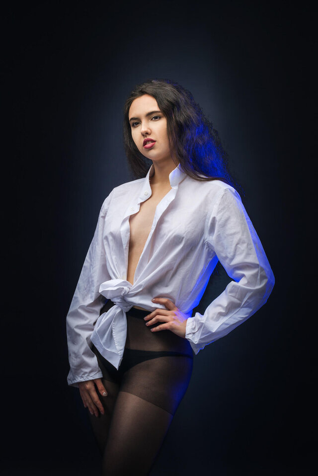 Beauty in a dark studio.