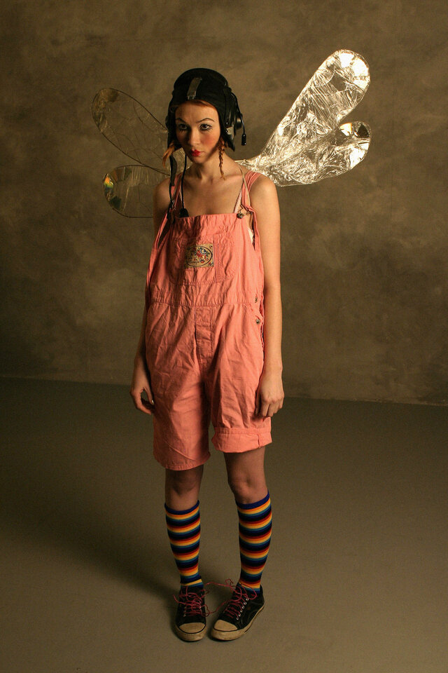 Clothing, Pink, Fashion, Costume, Dress, Costume design, Fictional character, Peach, Fawn, Wing