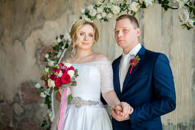 Bride, Wedding dress, Gown, Dress, Bridal clothing, Flower Arranging, Facial expression, Groom, Formal wear