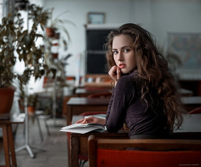Room, Sitting, Long hair, Desk, Table, Brown hair, Furniture, Classroom, Student