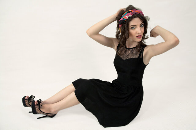 Fashion model, Beauty, Little black dress, Dress, Lady, Leg, Model, Sitting
